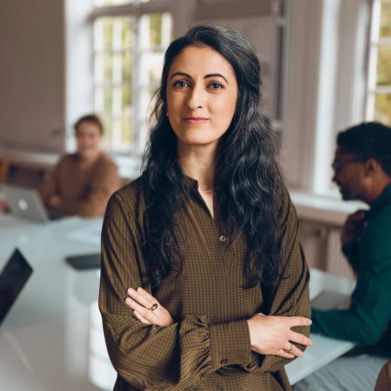 hr features female employee facing camera