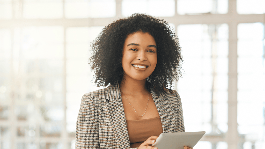 Woman standing with tablet